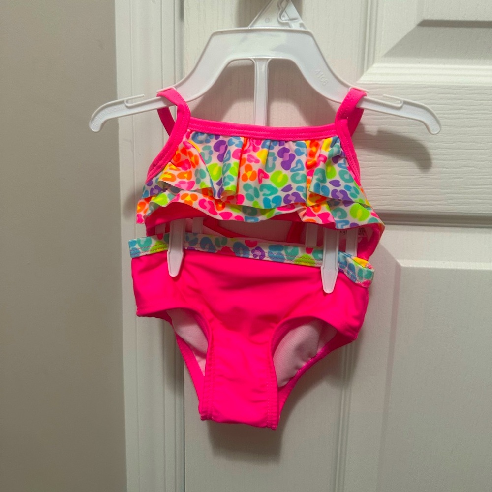 EUC Like New kids mix print pink ruffle bikini sz 6-9m worn a couple X perfect🤩